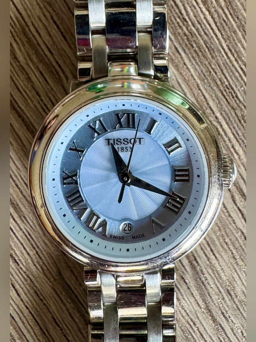LIKE NEW - TISSOT LADIES STAINLESS STEEL BLUE FACE BELLISSIMA SMALL
WATCH